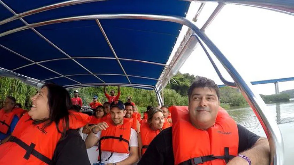 people in a boat heading to the saona island excursion